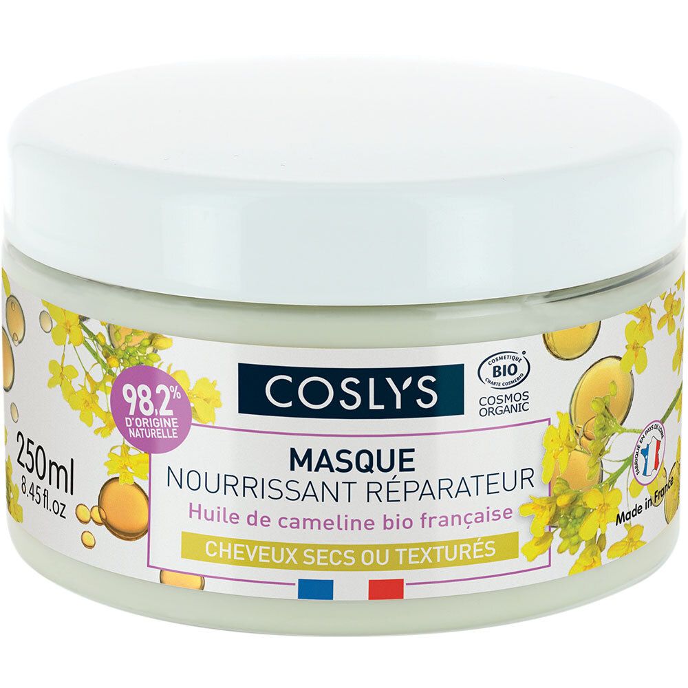 Runde Dose mit weißem Deckel. Aufschrift: Coslys Masque nourrissant réparateur. 98,2% natürlichen Ursprungs. Mit gelben Blüten.