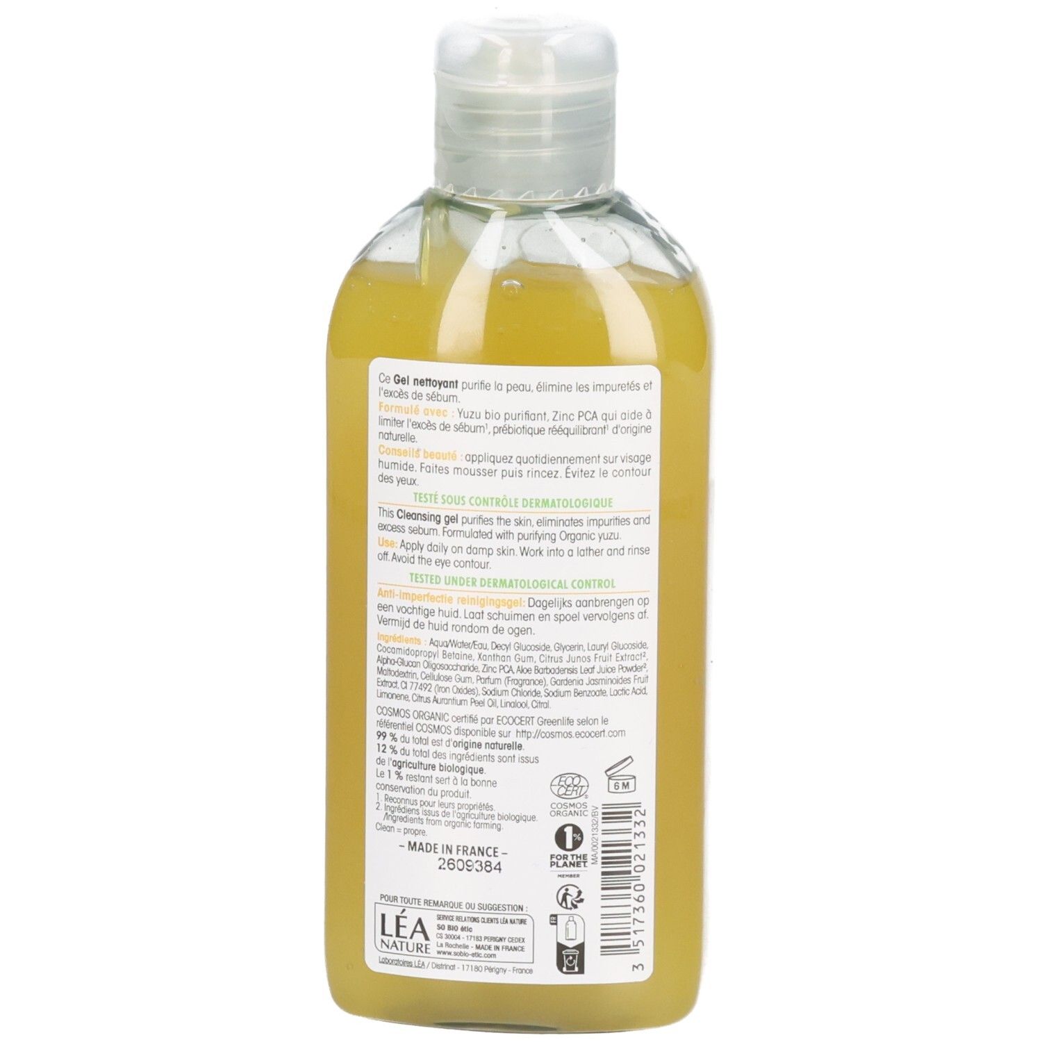 Rückseite der Flasche mit Produktinformationen und Inhaltsstoffen. Text in mehreren Sprachen.