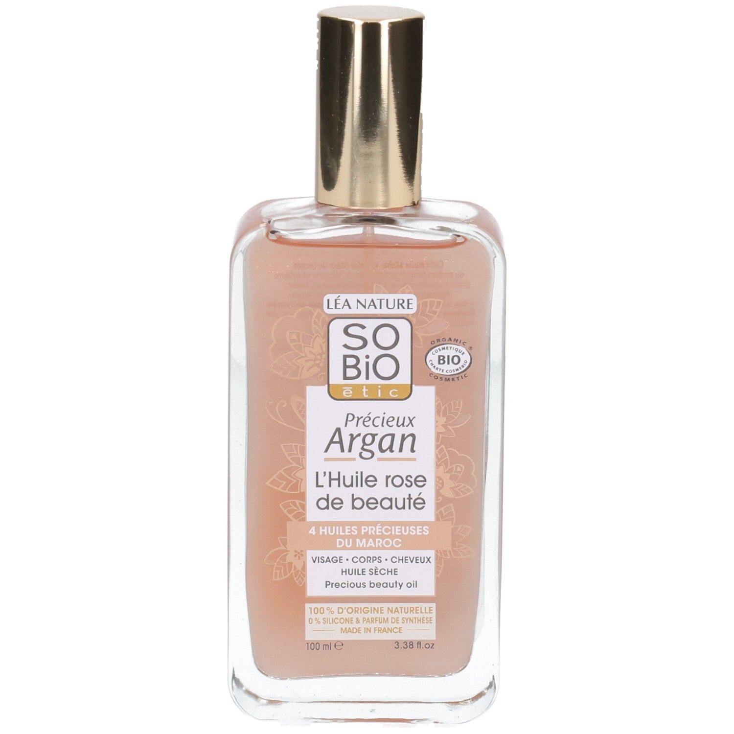 Klarflasche mit goldfarbenem Verschluss. Etikett mit Produktnamen und Bio-Siegel. Rosa Flüssigkeit sichtbar.