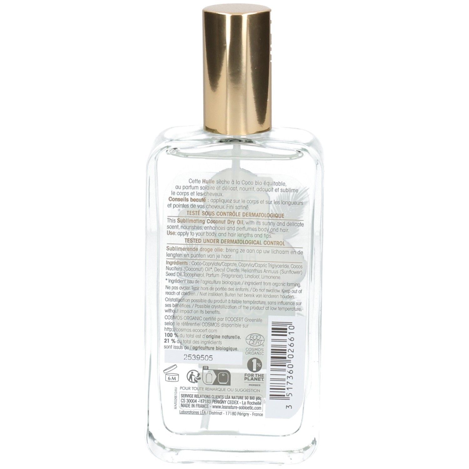 Vue arrière d'un flacon en verre transparent avec bouchon doré. Texte sur l'étiquette: So Bio Etic, ingrédients, testé dermatologiquement.
