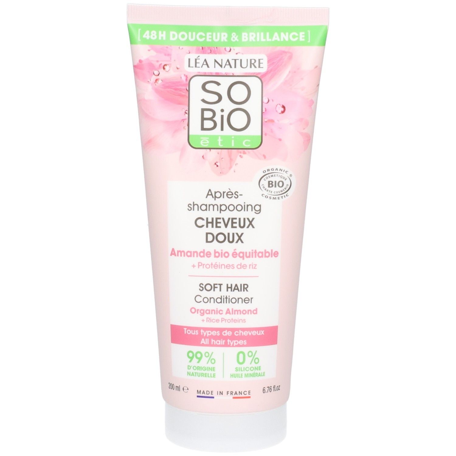 Rosa Tube mit grünem Deckel. Aufschrift: So Bio Etic Après-Shampooing Cheveux Doux. Bio-Zertifizierung. Text in Französisch und Englisch.