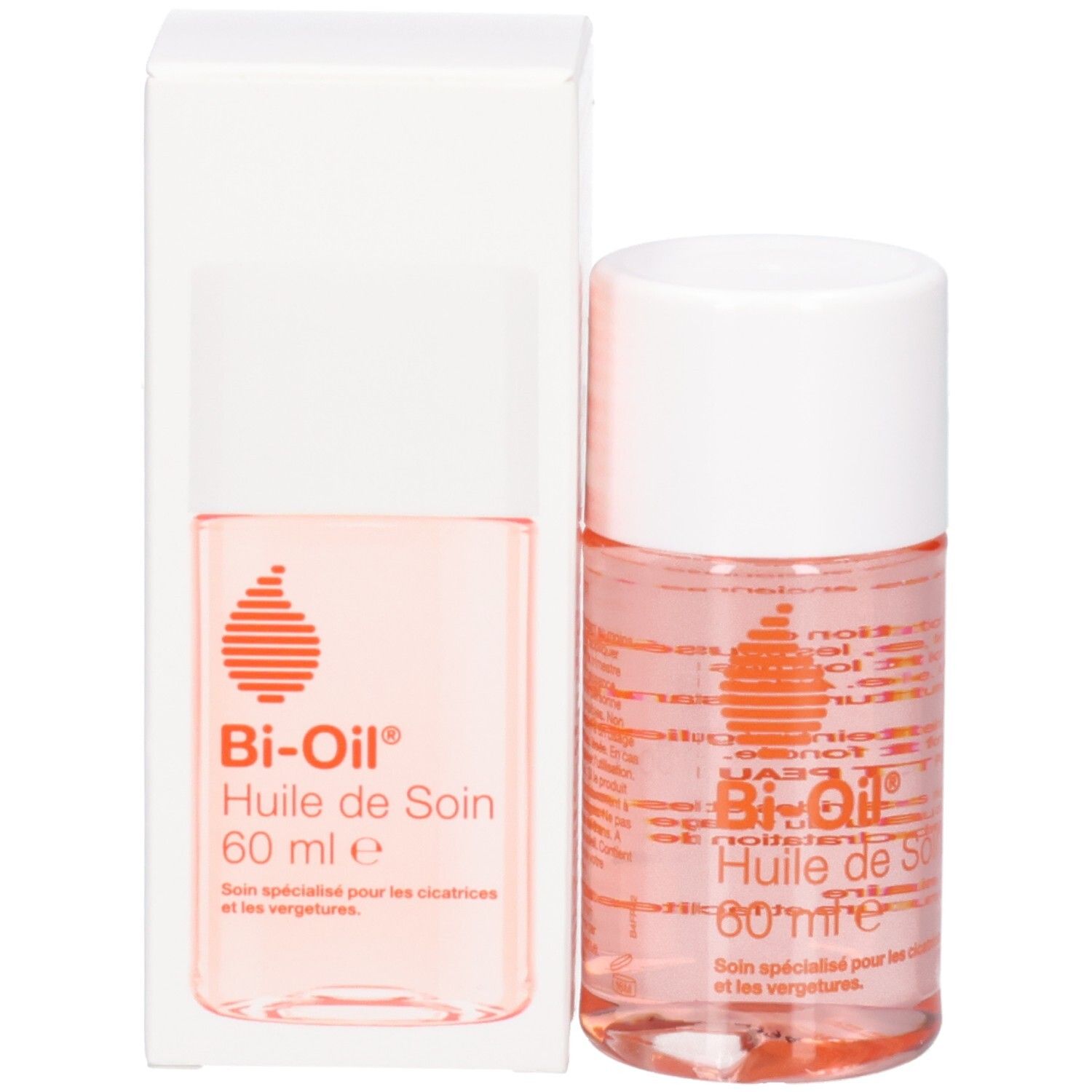 Produkt und Verpackung. Flasche und Schachtel. Aufschrift: Bi-Oil Huile de Soin. Rosa Flüssigkeit sichtbar.