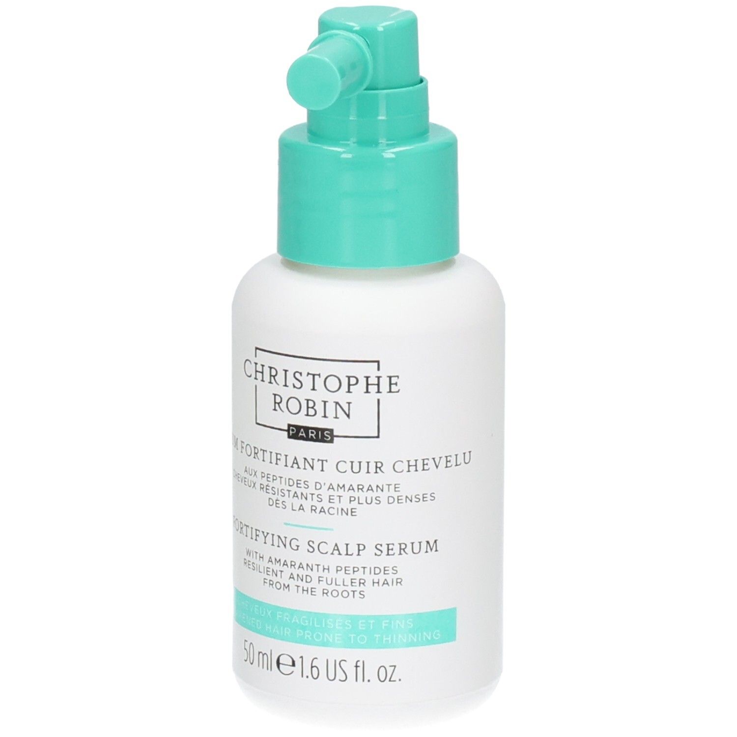 Weiße Flasche mit türkisfarbenem Sprühkopf. Beschriftung: SÉRUM FORTIFIANT CUIR CHEVELU, FORTIFYING SCALP SERUM. 50 ml.