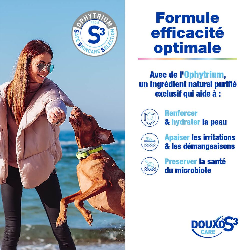 Frau mit Hund am Strand, DOUXO S3 CARE mit Ophytrum: stärkt, beruhigt Haut, schützt Mikrobiom.
