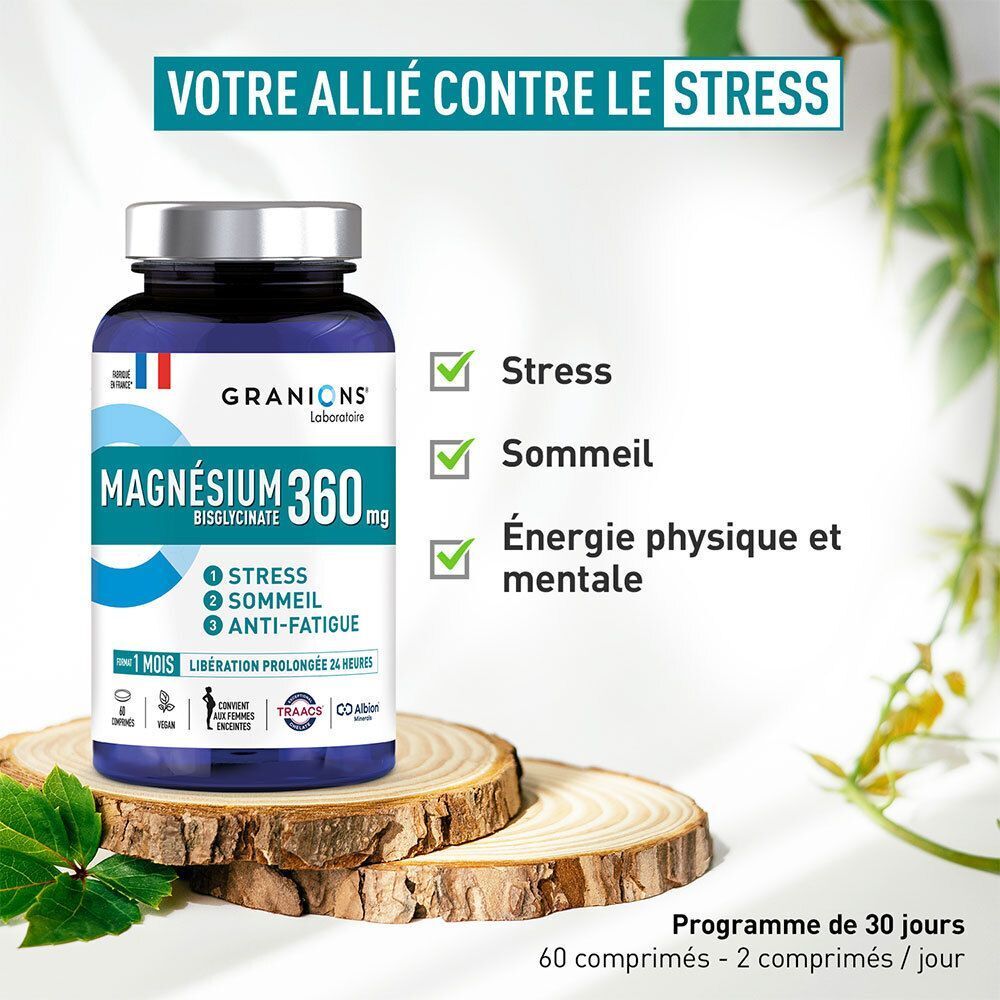 Eine Flasche Magnesium 360 mg von Granions Laboratoire auf Holzscheiben.