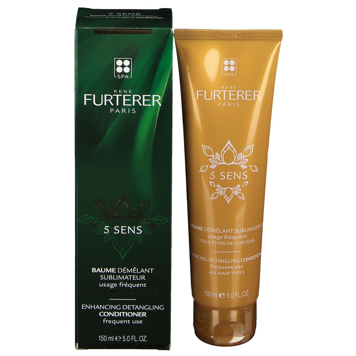 Produkt und Verpackung. Goldfarbene Tube und grüne Verpackung nebeneinander.
