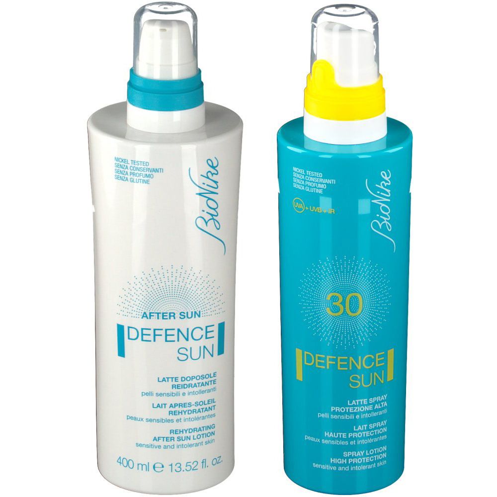 Deux flacons de protection solaire BioNike. À gauche, lotion après-soleil, à droite, spray solaire SPF 30. Avec vaporisateur.