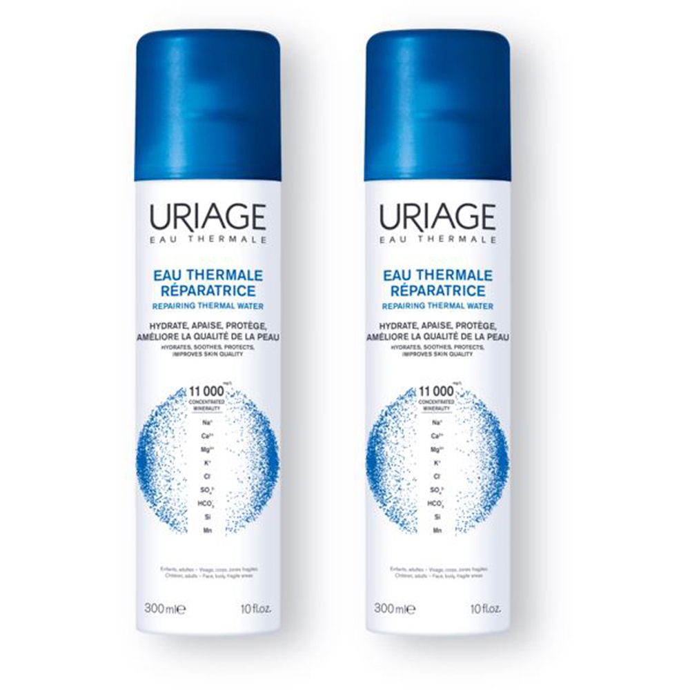 Deux flacons de spray avec bouchon bleu. Inscription: URIAGE EAU THERMALE. Texte: EAU THERMALE, URIAGE THERMAL WATER. Hypoallergénique. 300ml, 10 fl.oz.