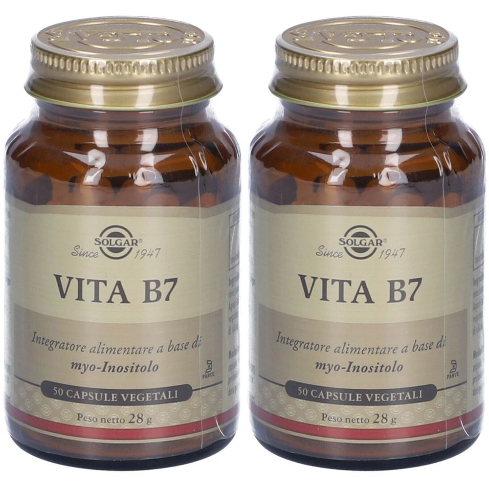 Deux flacons en verre brun avec des couvercles dorés. Chaque flacon porte l'inscription "VITA B7" et "SOLGAR".