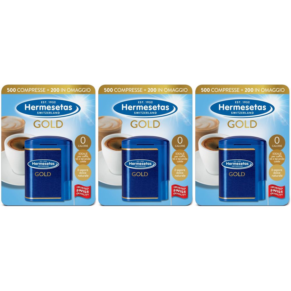 Drei Packungen Hermesetas Gold. Jede Packung enthält eine blaue Dose und eine Karte mit Text. Auf der Dose steht "GOLD".