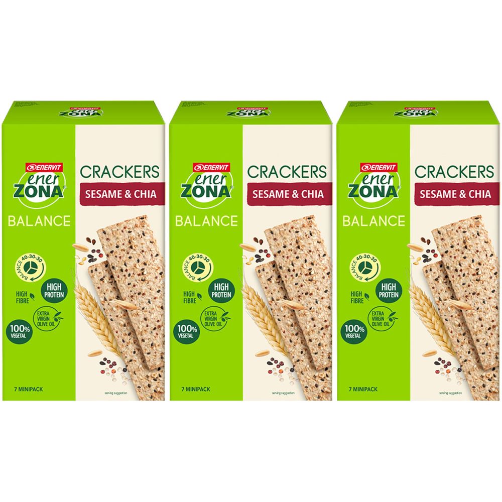 Drei Packungen Cracker. Aufschrift: EnerZona, Balance, Sesam & Chia. Grün-weiße Verpackung. Abbildung von Crackern, Körnern und Ähren.