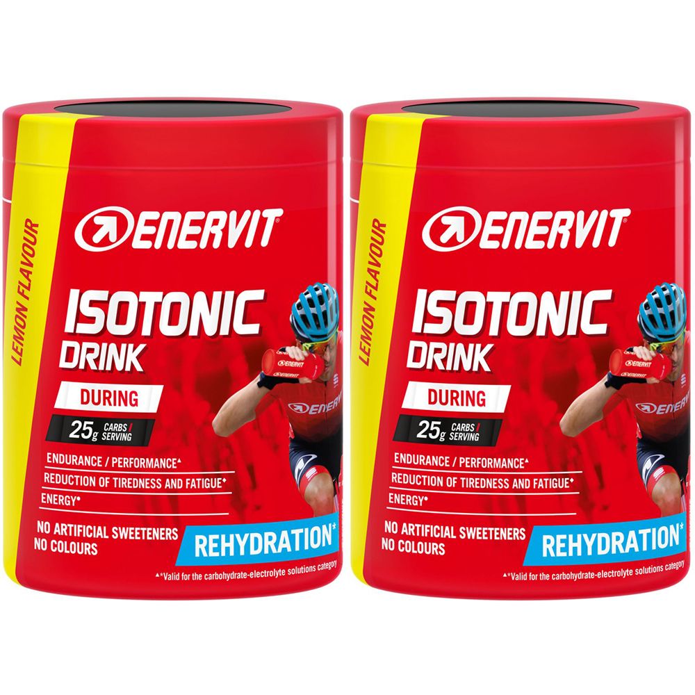 Deux boîtes rouges de boisson ENERVIT Isotonic. Inscription : Isotonic Drink, 25g glucides, réhydratation. Bande jaune avec Lemon Flavour.