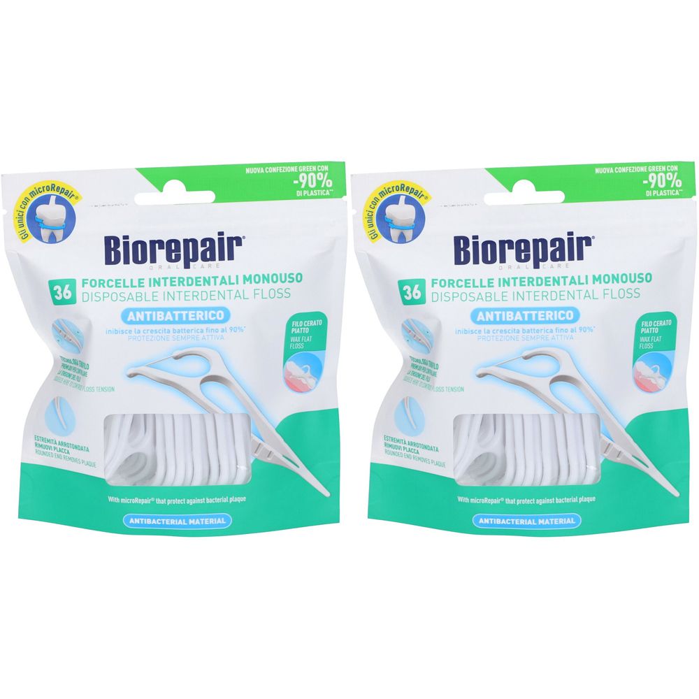 Zwei Packungen Biorepair Forcelle Interdentali Monouso. Weiße Zahnseide-Halter mit grün-weißer Verpackung. Antibakteriell.