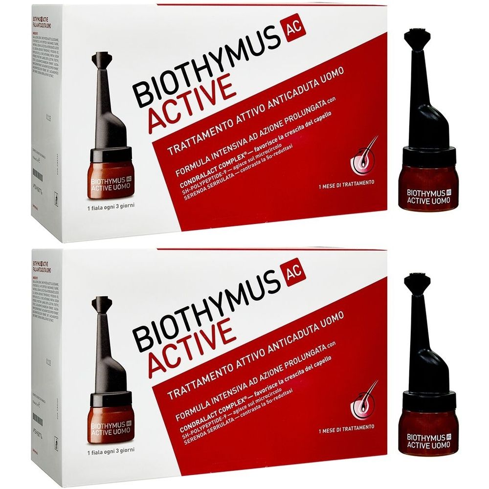Deux boîtes de traitement capillaire pour hommes. Inscription: BIOTHYMUS AC ACTIVE. Emballage rouge et blanc. Petits flacons avec applicateur.
