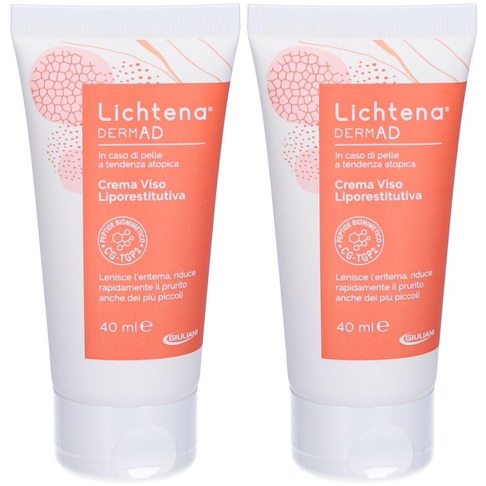 Zwei Tuben Creme, weiß mit orangefarbener Beschriftung. Aufschrift: Lichtena DermAD, Crema Viso Liporestitutiva, 40 ml.