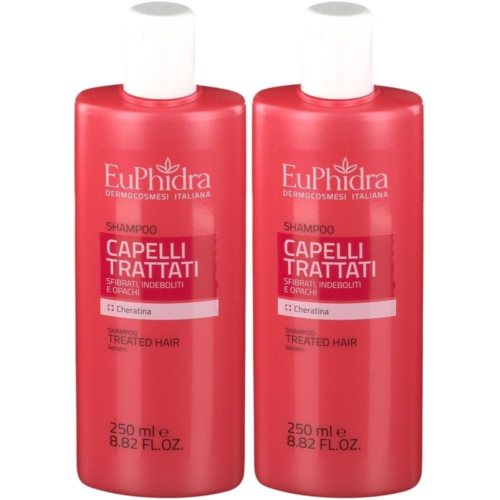 Deux flacons de shampooing rouges avec bouchons blancs. Inscription: EuPhidra, Shampooing, Capelli Trattati, 250 ml. Contient de la kératine.