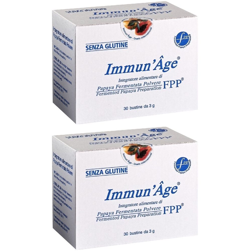 Deux boîtes blanches Immun'Âge. Inscription: Integratore alimentare di Papaya Fermentata Polvere. 30 sachets.