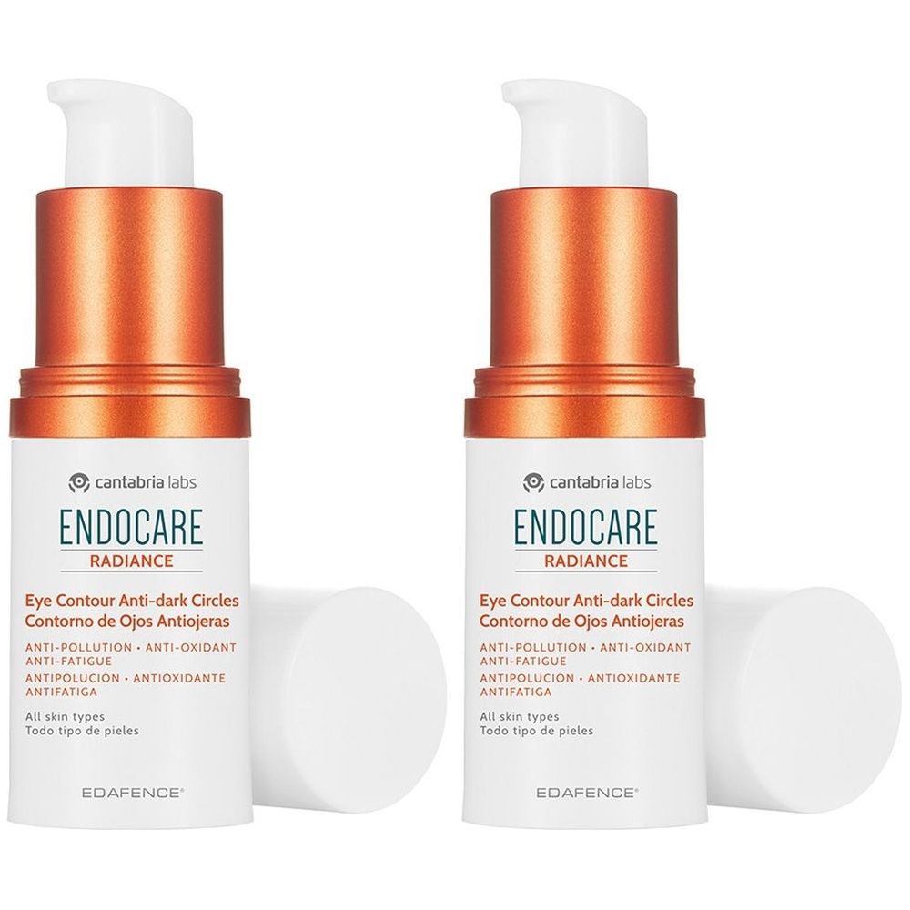 Deux flacons Endocare Radiance Contorno Occhi. Flacons blancs avec parties supérieures orange et pompes blanches. Texte: ENDOCARE RADIANCE.