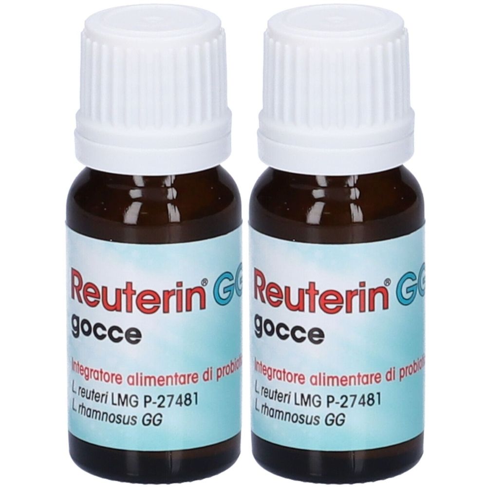 Deux flacons en verre brun avec bouchons blancs. Étiquettes bleues avec texte "Reuterin G gocce".