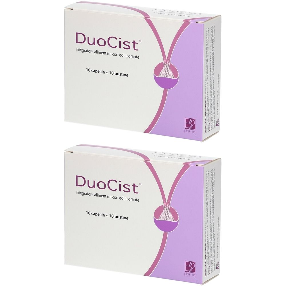 Zwei Schachteln DuoCist. Weiße Verpackung mit lila Design und Produktinformationen. Aufschrift: 10 Kapseln + 10 Beutel.