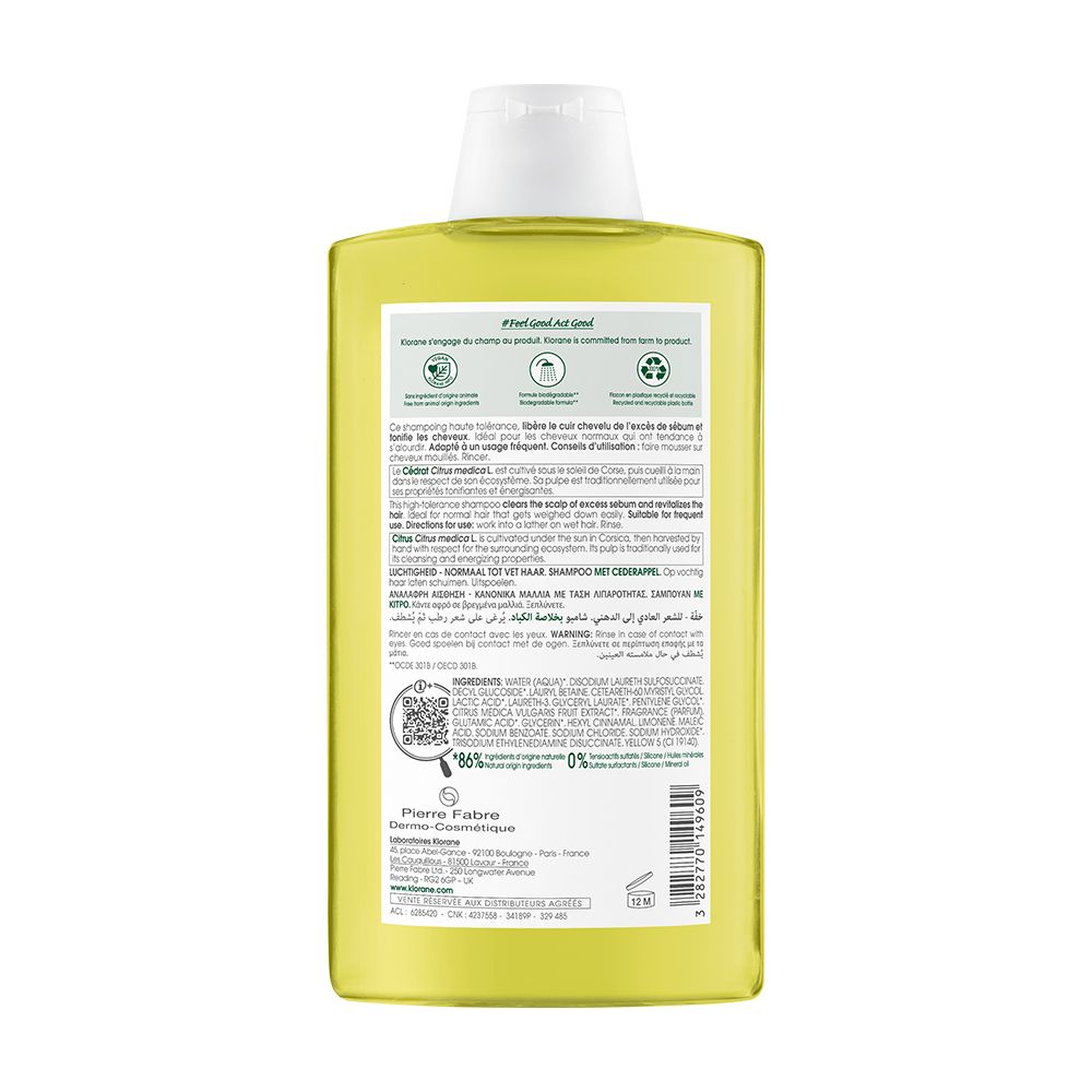 Dos du flacon de shampooing Klorane jaune. Texte multilingue. Code QR et logo de recyclage.