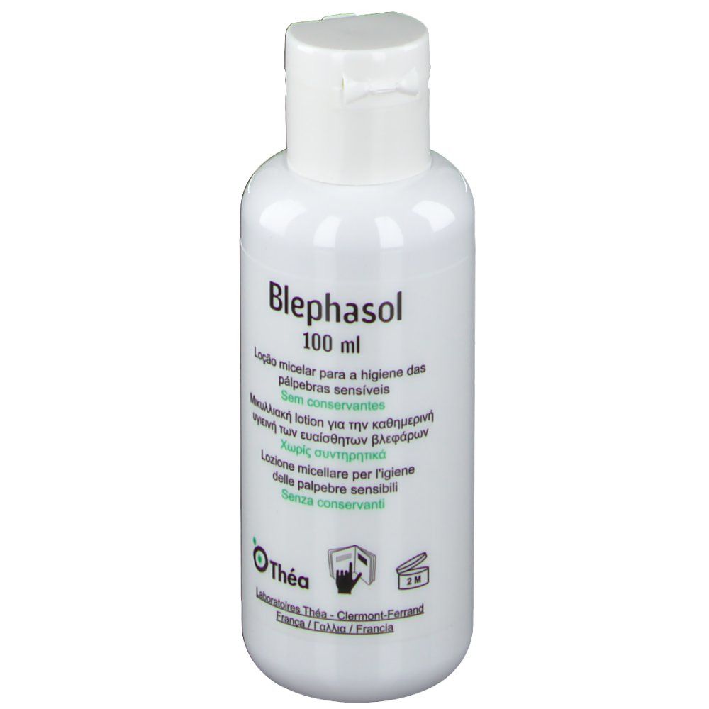 Flacon blanc avec bouchon rabattable. Inscription: Blephasol, 100 ml. Texte multilingue. Logo Théa.