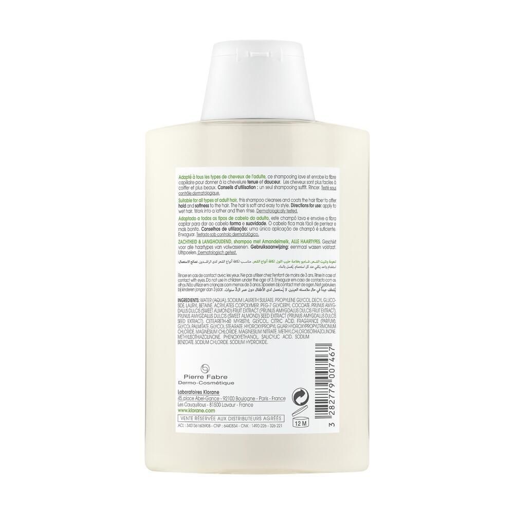 Rückseite der KLORANE Mandelmilch-Shampoo-Flasche. Text in mehreren Sprachen, Inhaltsstoffe, Herstellerinformationen.