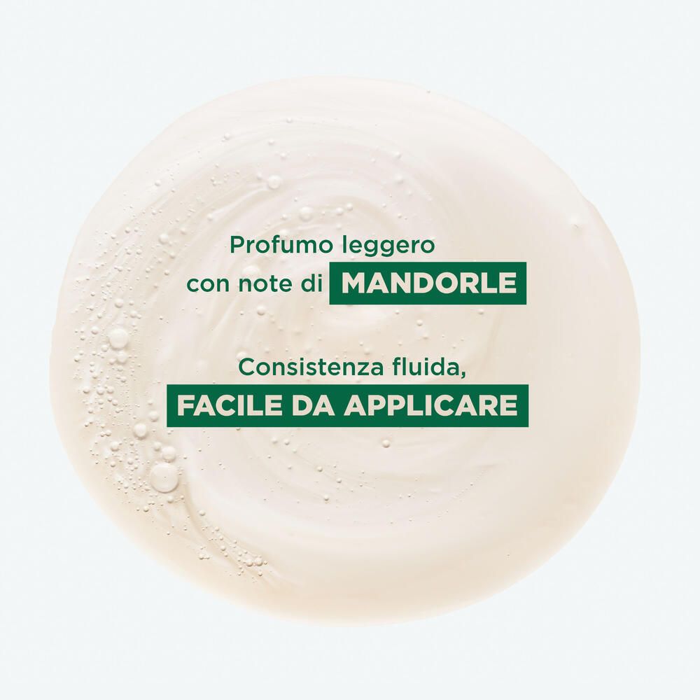 Nahaufnahme einer cremigen Substanz. Text: 'Duft mit Mandeln', 'Flüssige Konsistenz, einfach anzuwenden'.