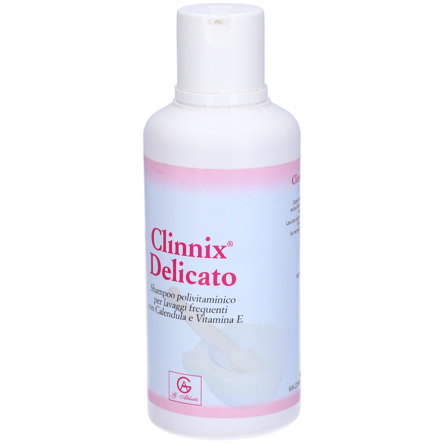 Bouteille blanche avec bande rose et inscription Clinnix Delicato. Shampooing pour lavages fréquents.