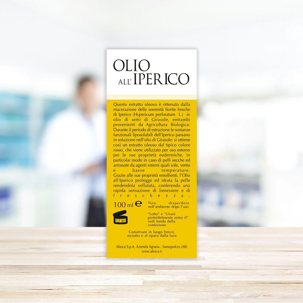 Boîte jaune avec texte du produit. Texte : Olio all'Iperico. Marque : Aboca. Avec un design jaune et blanc.