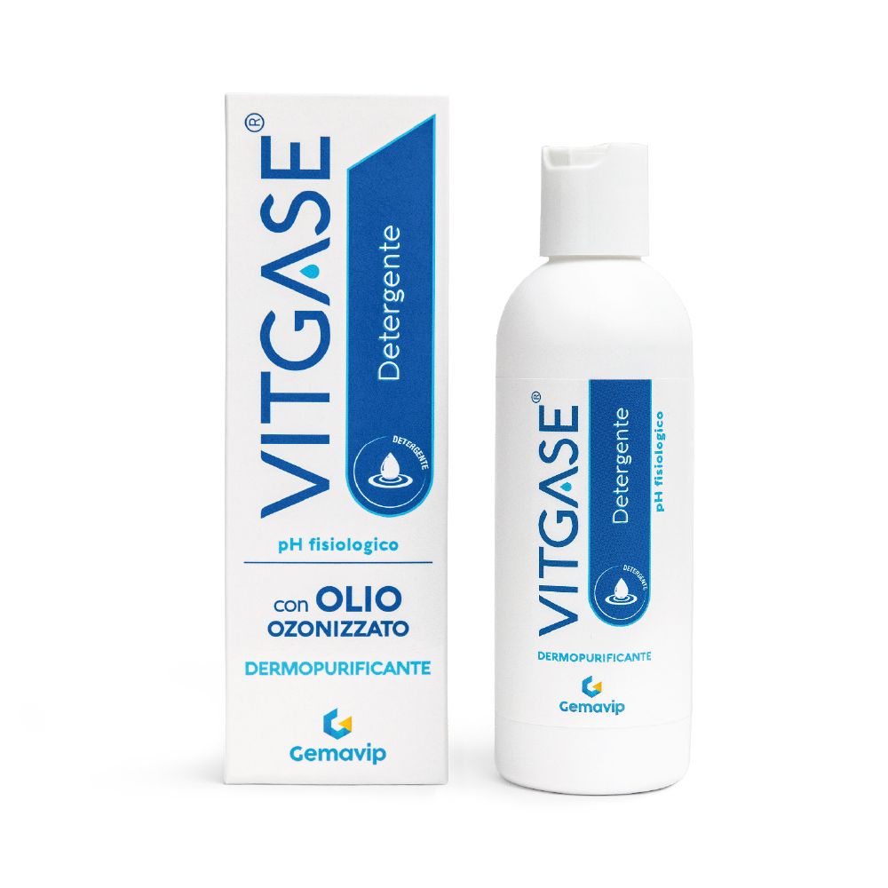 Nettoyant Vitgase® en flacon blanc et boîte, avec des accents bleus.