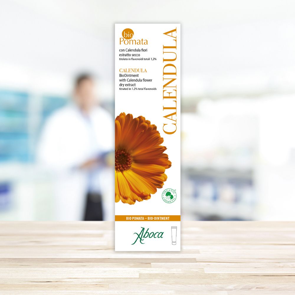 Emballage Aboca® Ringelblume bioPomata. Face avant avec nom du produit, illustration de calendula et label bio. Texte en allemand et italien.