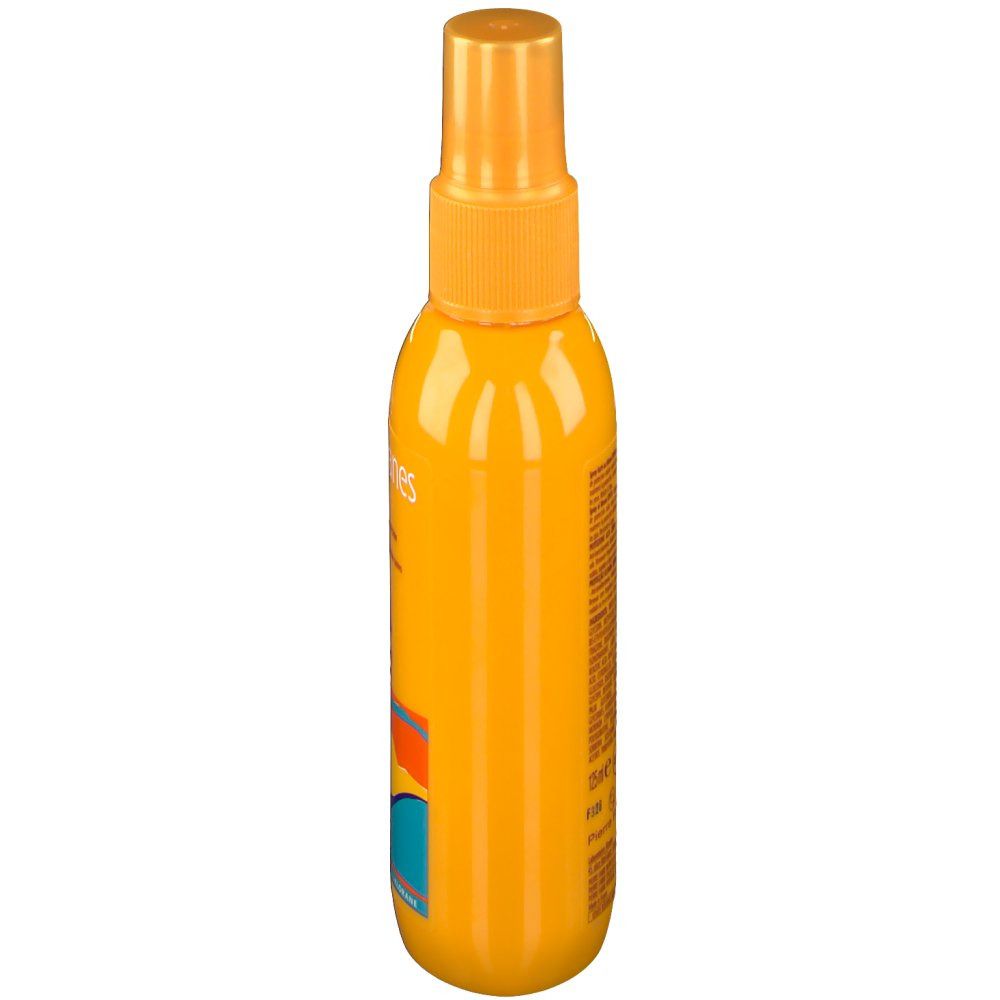 Gelbe Sprühflasche, Seitenansicht. Aufschrift nicht lesbar. Farbige Wellenmuster am unteren Ende.