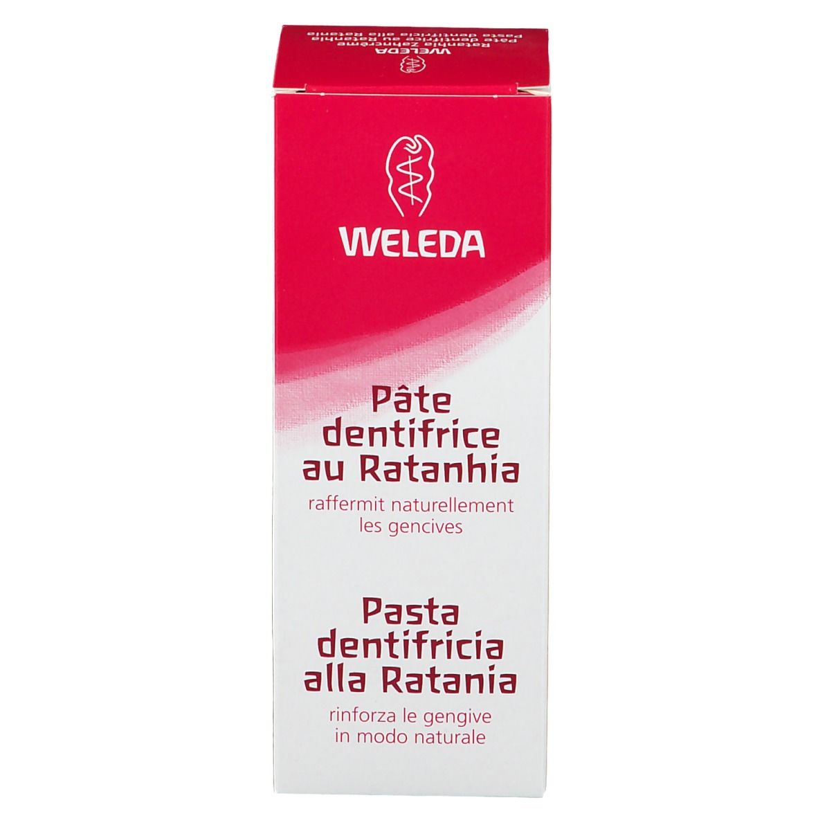Karton, pink-weiß. Beschriftung: WELEDA, Pâte dentifrice au Ratanhia, Pasta dentifricia alla Ratania.