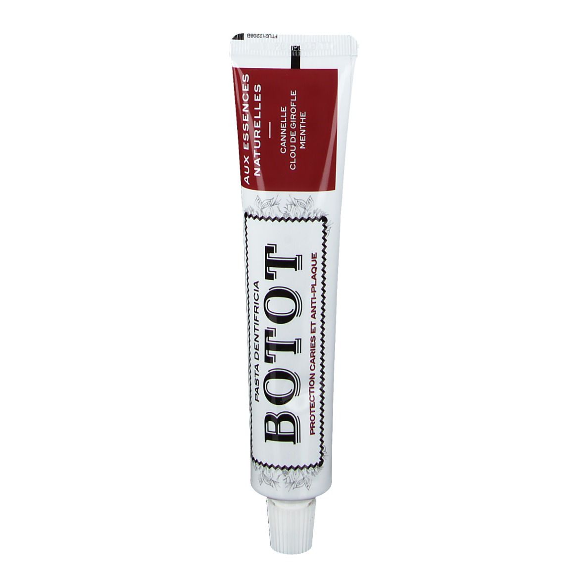Zahncreme-Tube BOTOT. Aufschrift: Pasta Dentifricia. Aromen: Zimt, Nelke, Minze. Weiß, rot und schwarz.