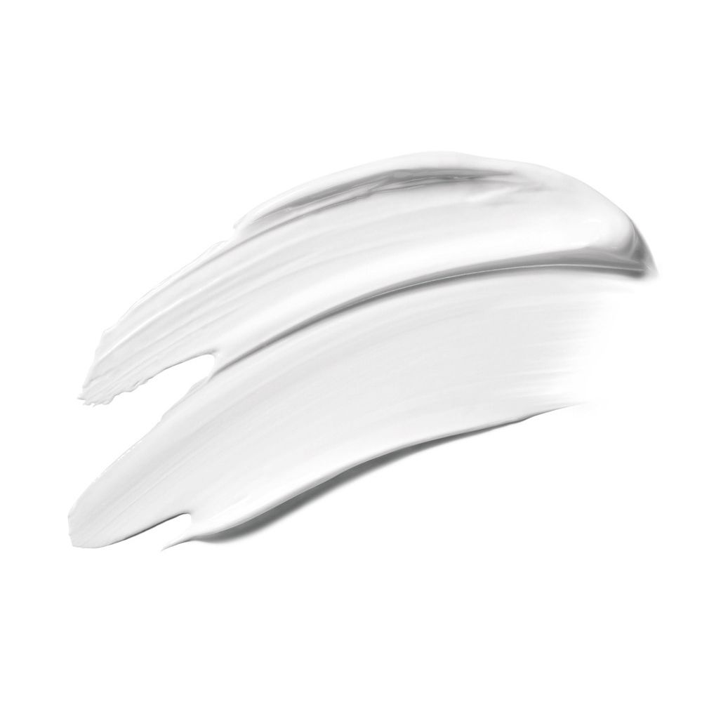 Trace de baume blanc. Texture lisse. Sur fond blanc.