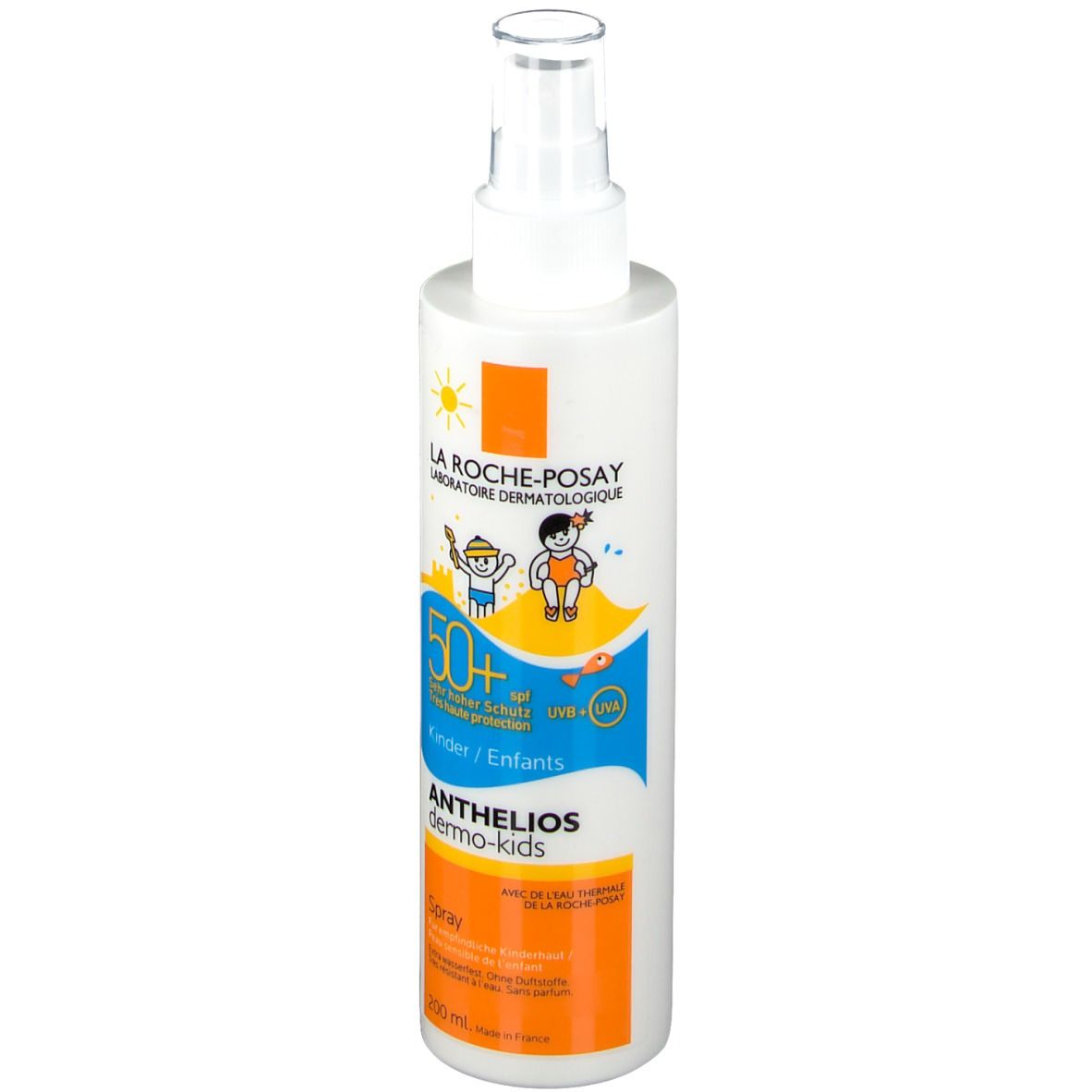 Flacon spray blanc et orange. Inscription: Anthelios dermo-kids Spray. Illustrations d'enfants à la plage. Protection solaire 50+.