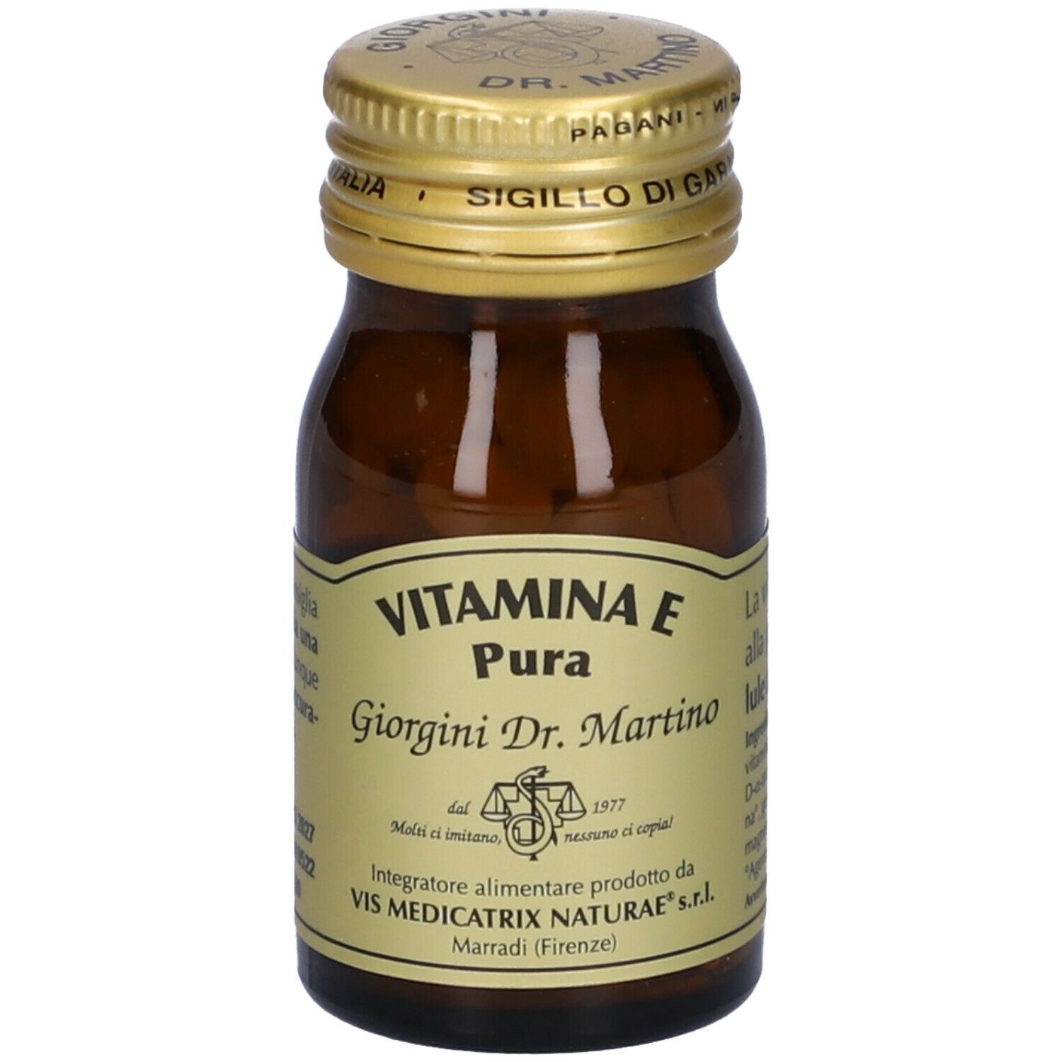 Flacon en verre brun avec bouchon doré. Inscription : VITAMINA E Pura, Giorgini Dr. Martino. Étiquette avec informations.