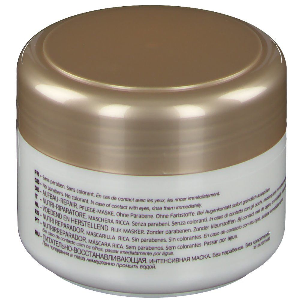 Pot blanc avec couvercle doré. Texte multilingue. Inscription: Nutri Réparateur, Maschera Rica.