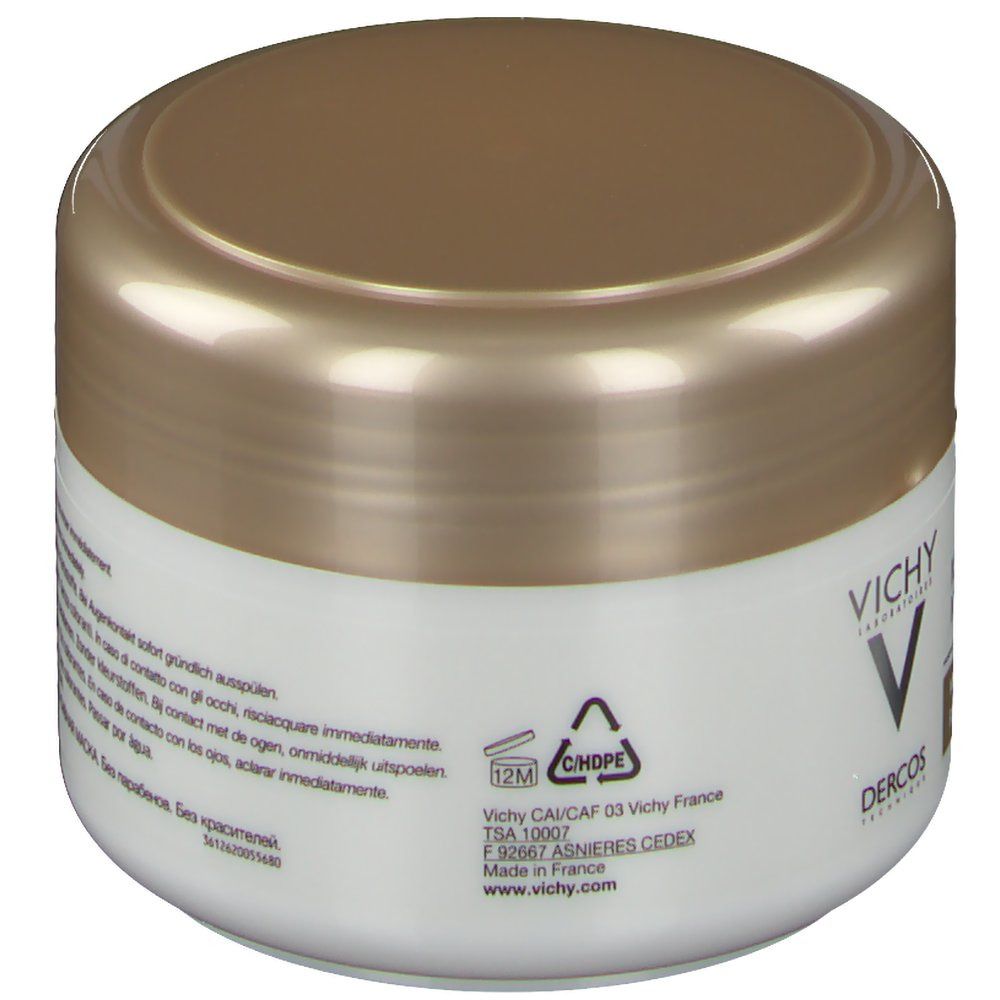 Pot blanc avec couvercle doré. Inscription: Vichy, Dercos. Texte multilingue. Symbole de recyclage.