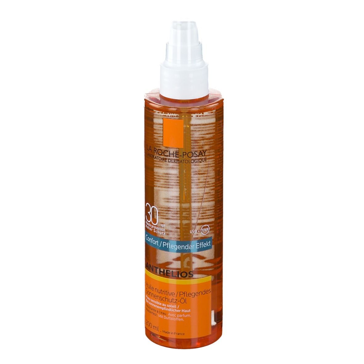 LA ROCHE-POSAY Anthelios SPF 30 Pflegeöl. Transparente Flasche mit Sprühkopf. Orangefarbene Flüssigkeit. Produktbeschriftung sichtbar.