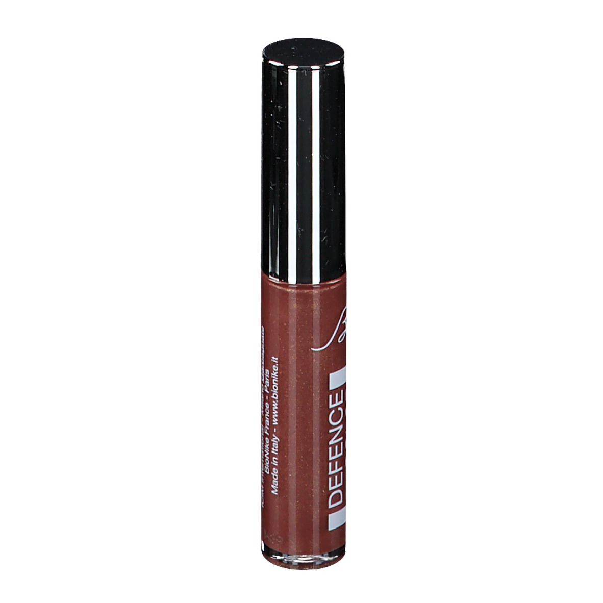 Gloss à lèvres brun avec bouchon argenté. Inscription: DEFENCE COLOR CRYSTAL LIPGLOSS.