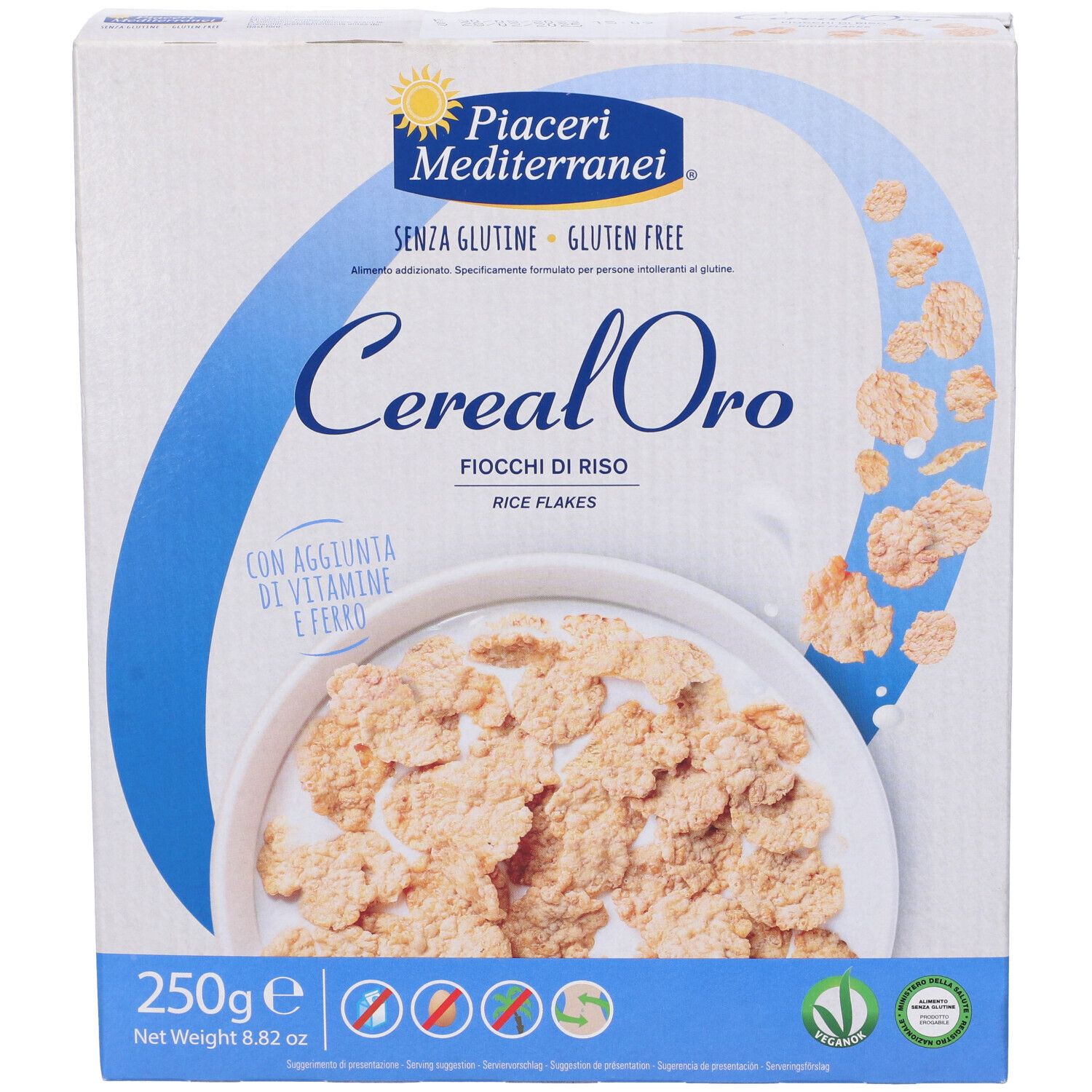 Boîte de Piaceri Mediterranei® Cereal Oro Fiocchi di Riso. Inscription: Cereal Oro, Fiocchi di Riso, sans gluten. 250g.