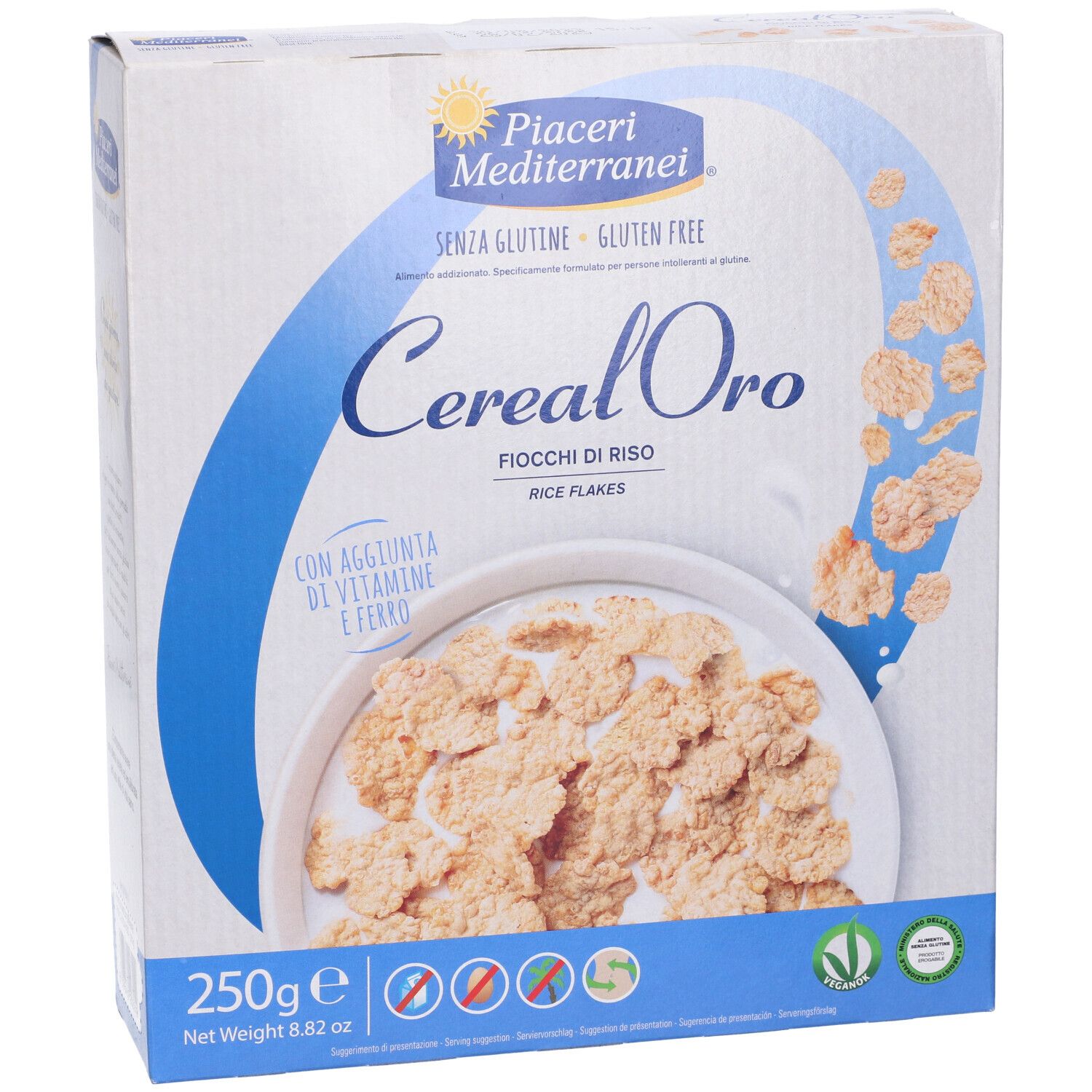 Boîte de Piaceri Mediterranei® Cereal Oro Fiocchi di Riso. Inscription: Cereal Oro, Fiocchi di Riso, sans gluten. 250g.