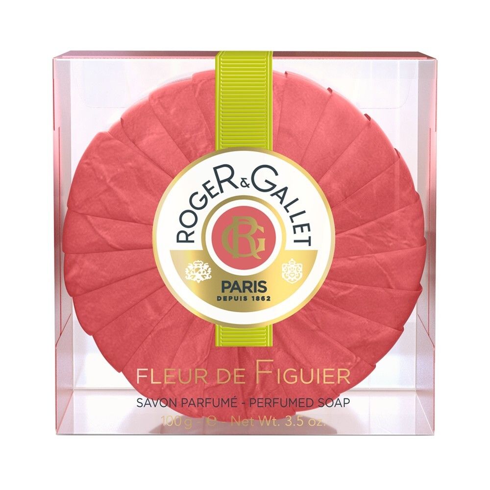 Savon rond dans boîte transparente. Couleur rouge, logo et texte 'Fleur de Figuier'. Ruban vert.