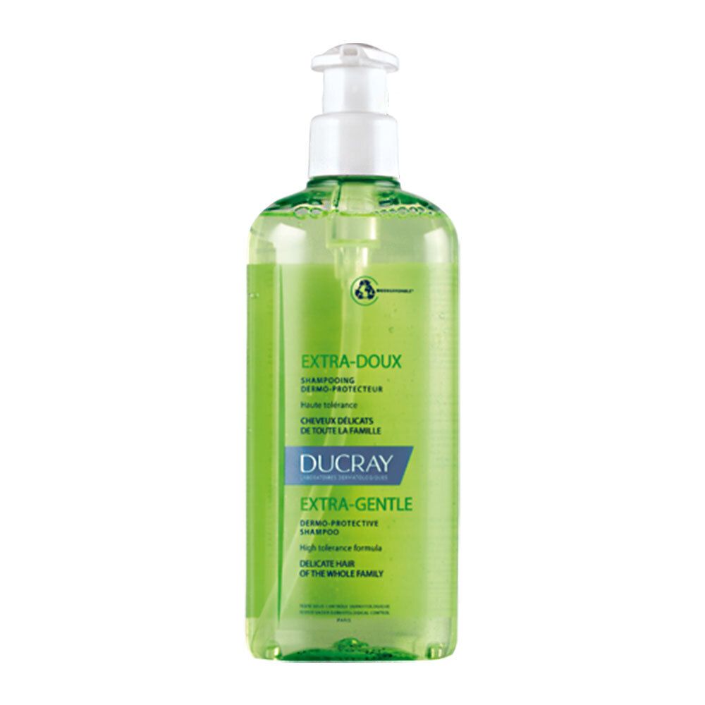 Flacon de shampooing vert avec pompe blanche. Inscriptions: EXTRA-DOUX, DUCRAY. Pour cheveux délicats.