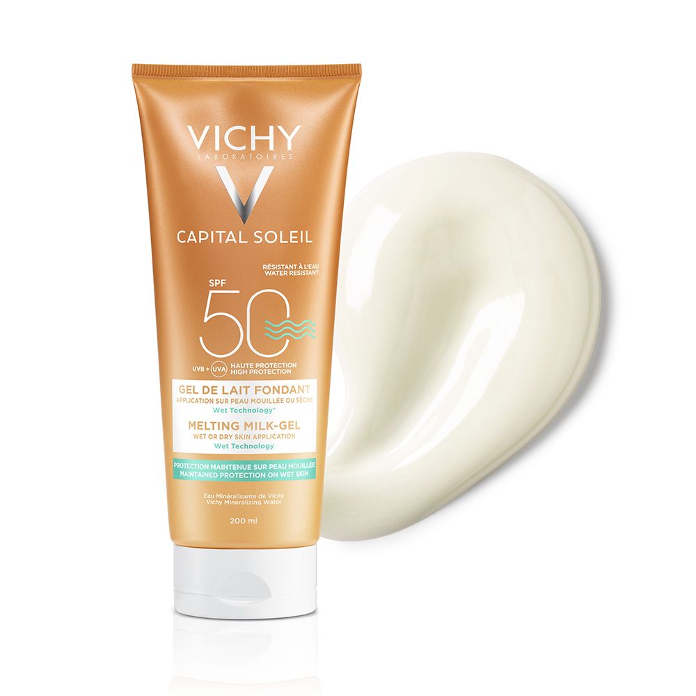 Sonnenmilch-Gel-Tube, goldfarben, mit weißem Verschluss. Daneben eine Spur des Produkts. Aufschrift: VICHY, CAPITAL SOLEIL, SPF 50.