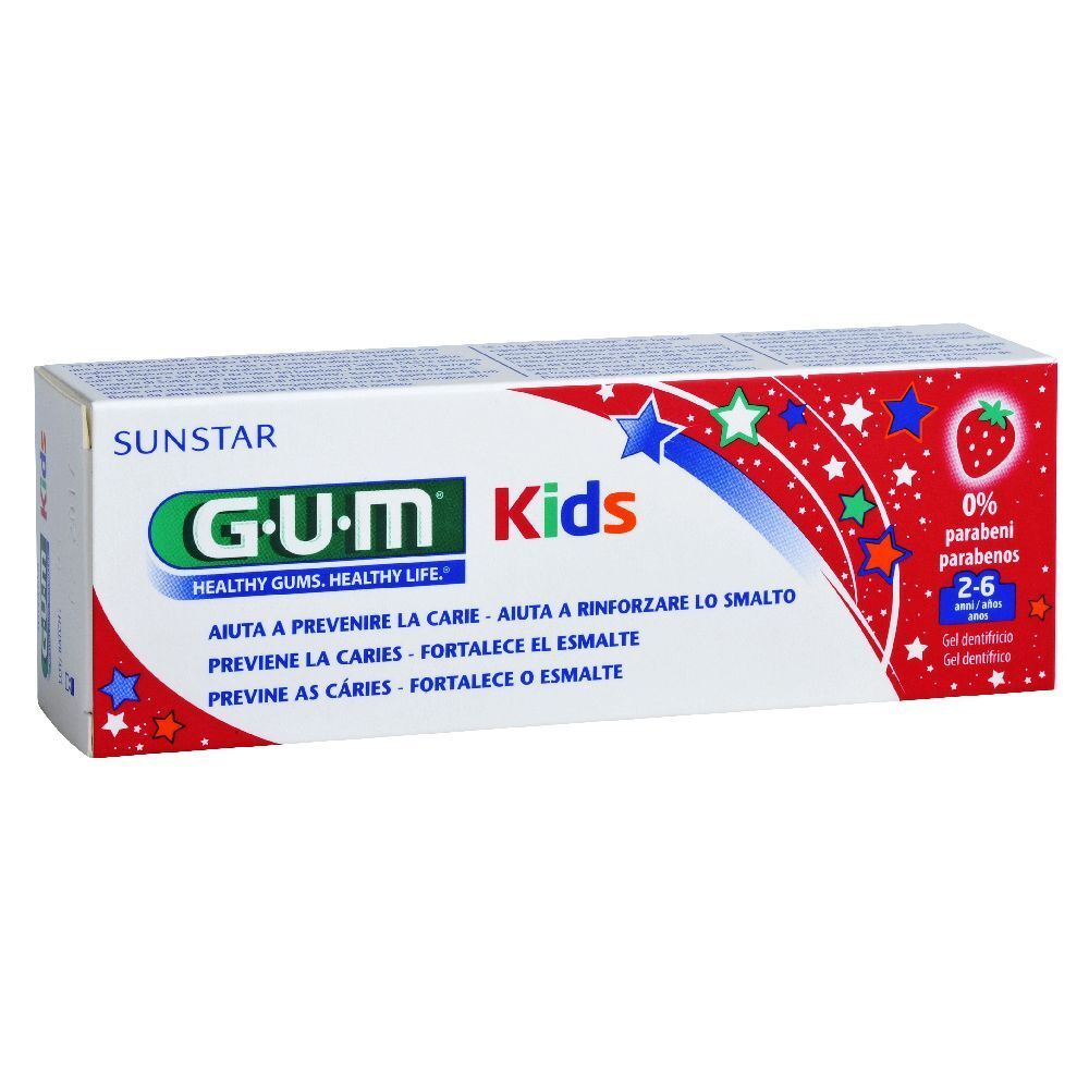 Zahnpasta-Gel-Verpackung. G.U.M. Kids, 2-6 Jahre. Rote und weiße Verpackung mit Sternen und Erdbeere. Enthält 0% Parabene.