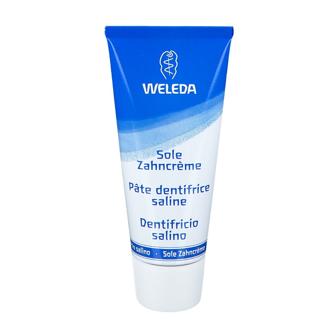 Tube de dentifrice bleu avec bouchon blanc. Inscriptions: WELEDA, Sole Zahncrème, Pâte dentifrice saline, Dentifricio salino.