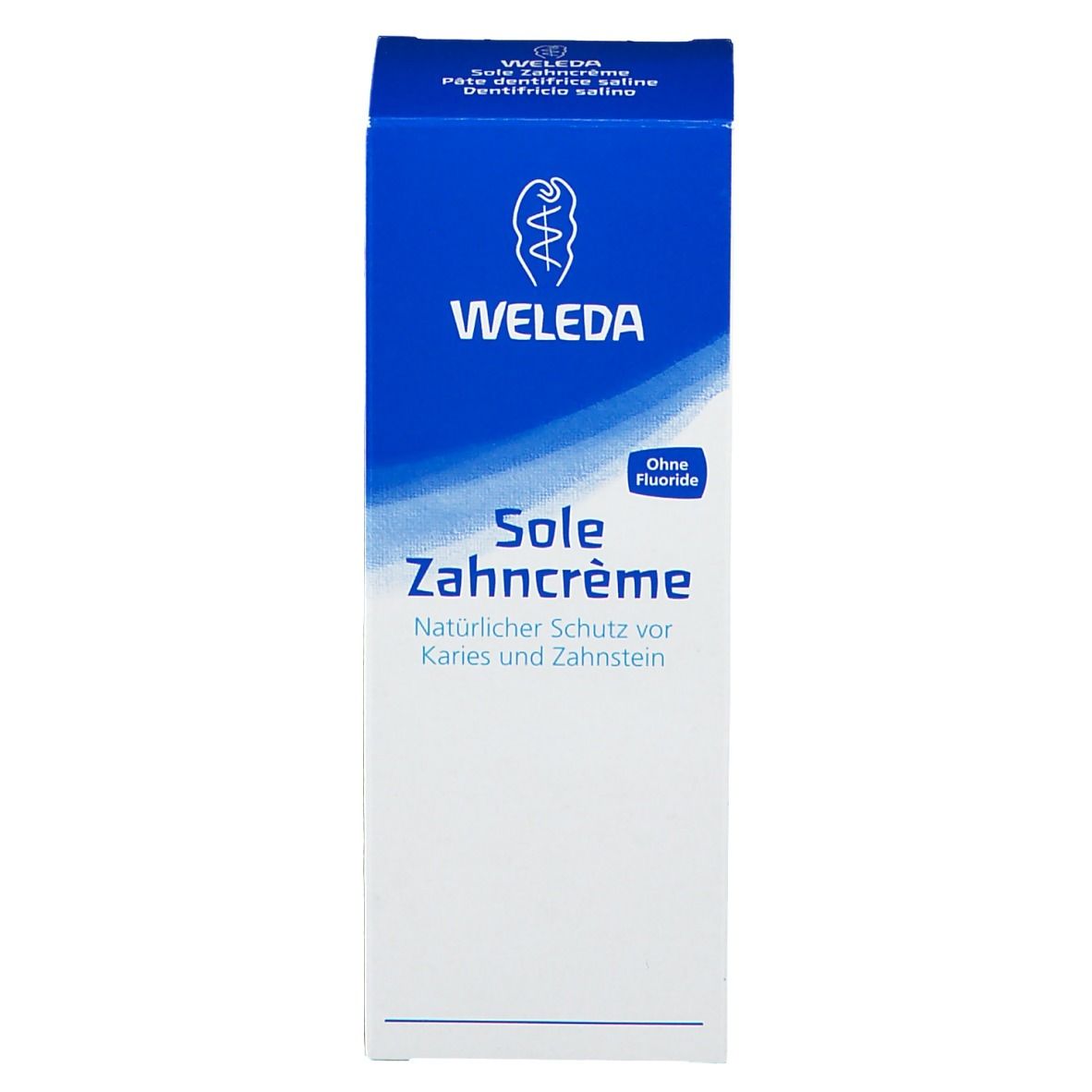 Face avant de la boîte de dentifrice. Boîte bleue avec texte blanc. Inscriptions: WELEDA, Sole Zahncrème, Sans fluor.